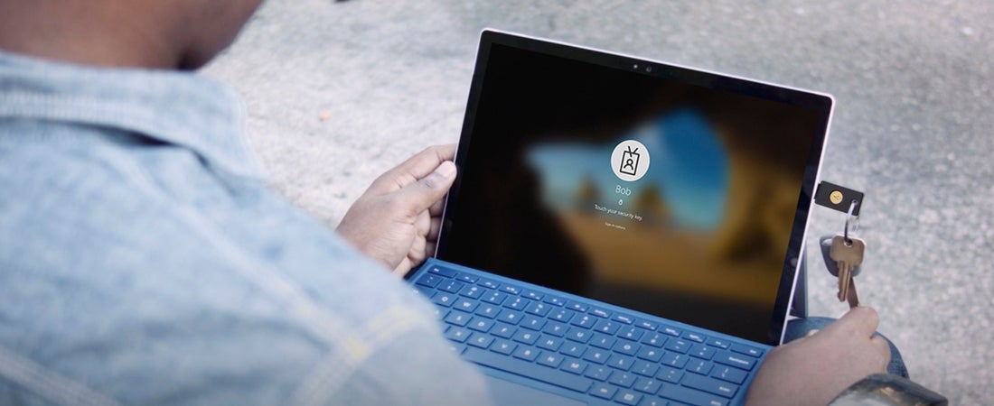 person logging into laptop using YubiKey and Microsoft Azure AD