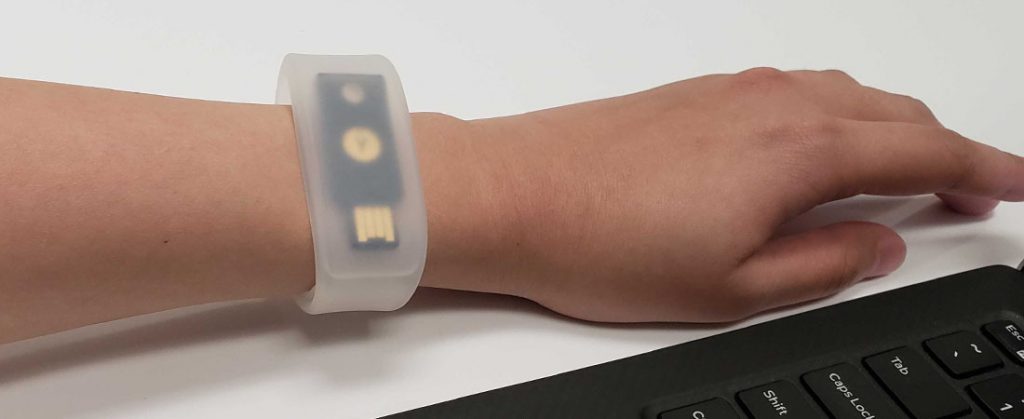 pocketband with YubiKey 5 NFC on person's wrist