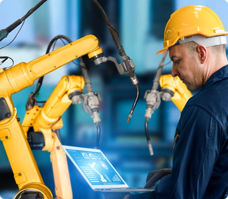 man working with mechanical arm