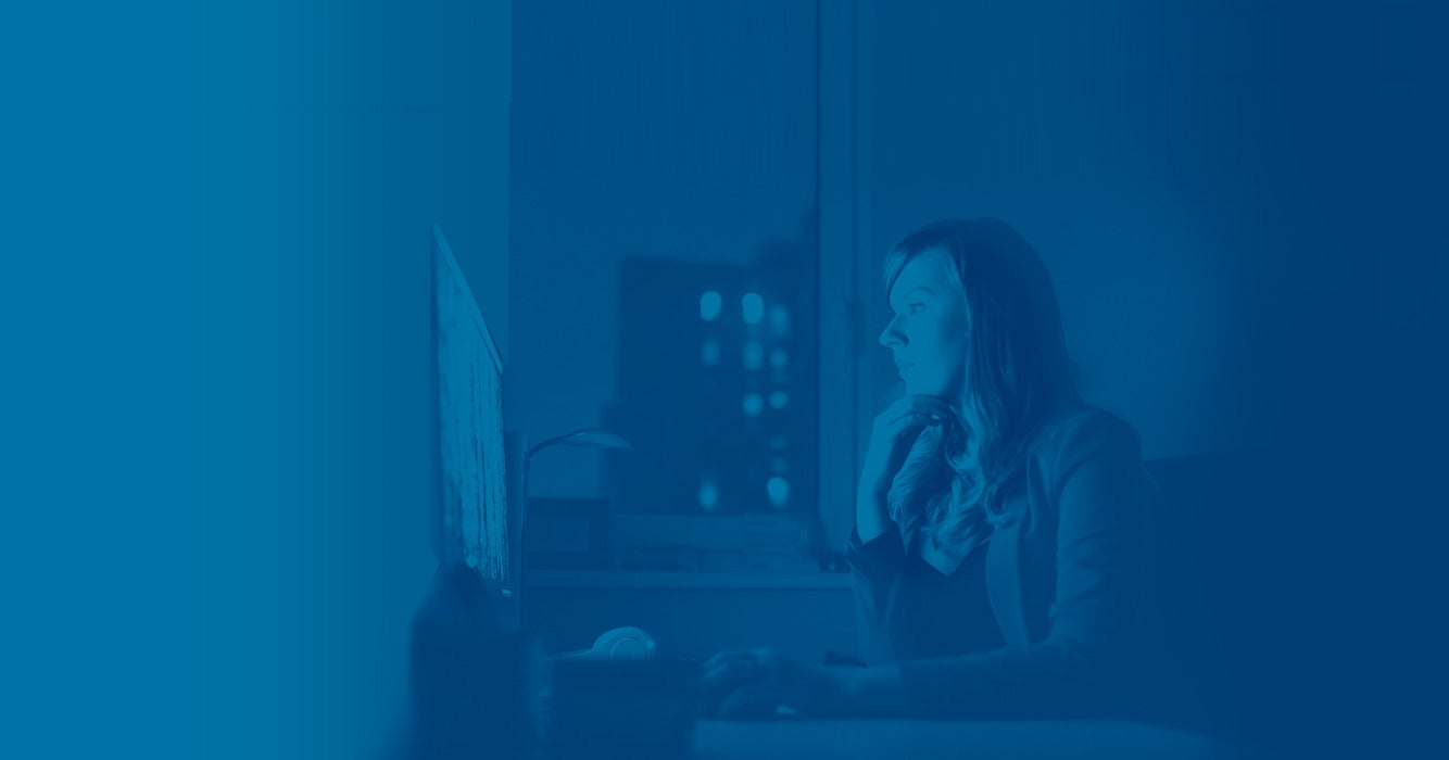 woman in front of computer screen