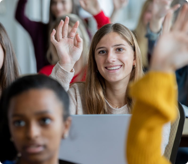 student raising their hand