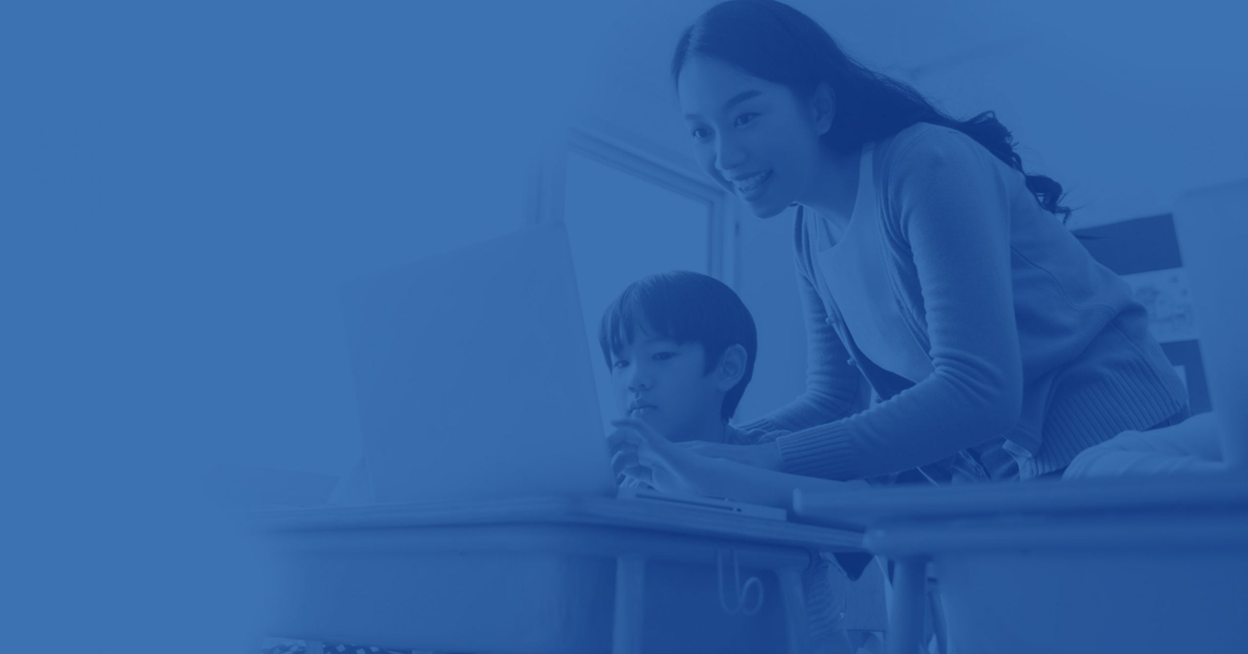 woman and child on laptop