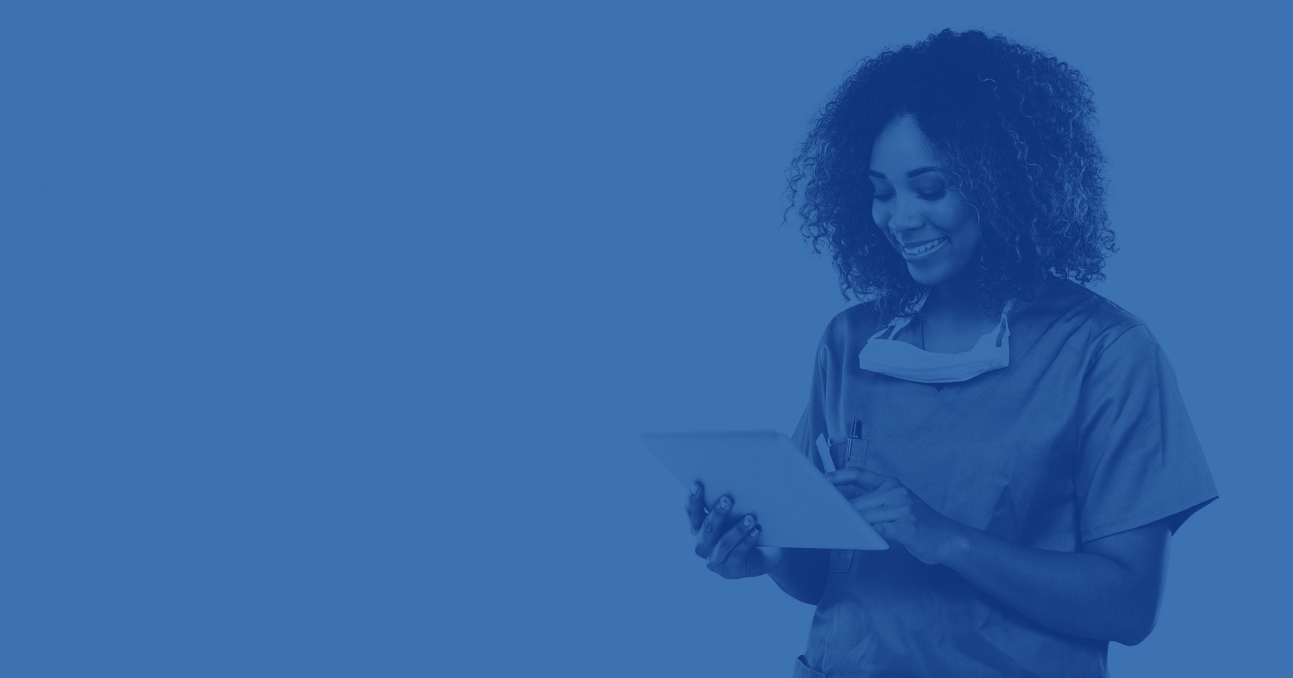 healthcare worker on tablet