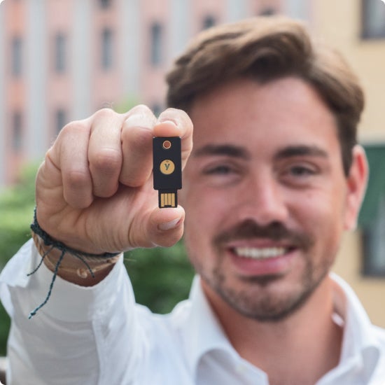 Man holding YubiKey