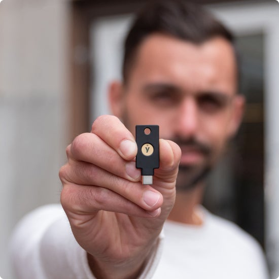 Man holding YubiKey