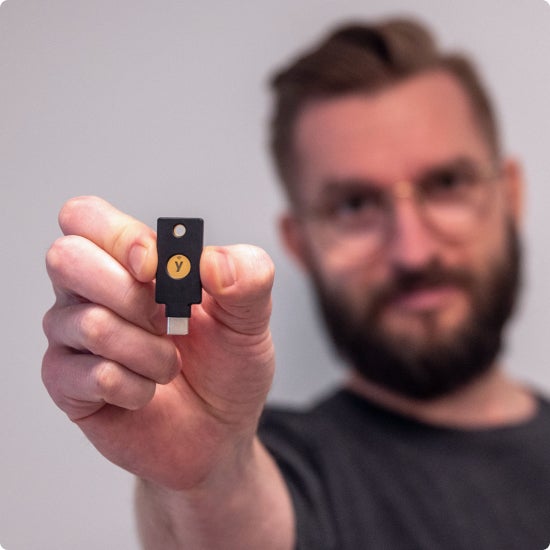 Man holding YubiKey