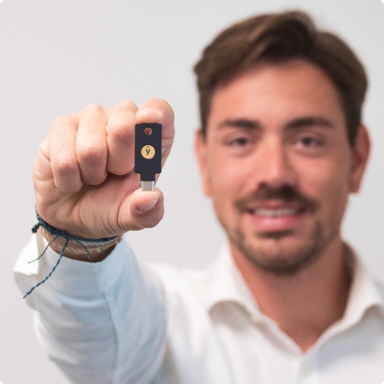 Man holding YubiKey