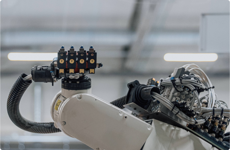 robotic arm manufacturing yubikeys